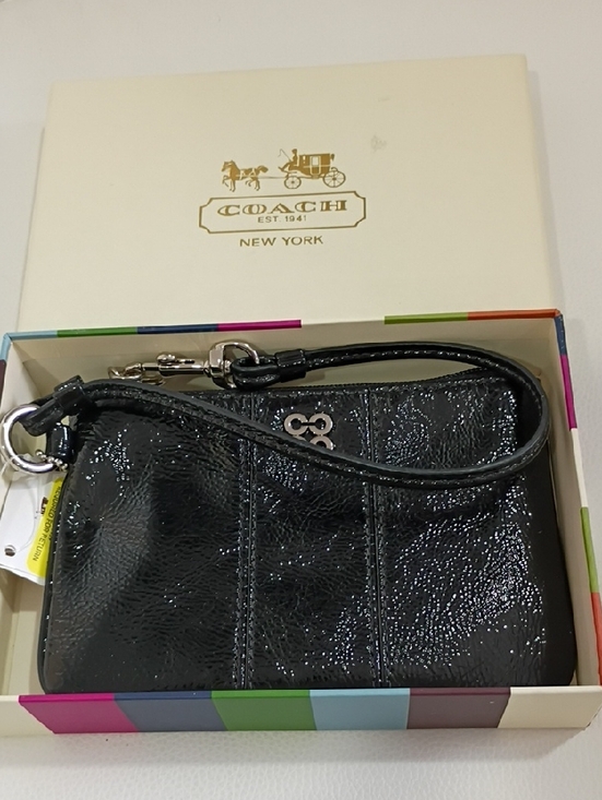 Coach Handbags - Coach Julia Black Patent Leather Wristlet with Silver Hardware